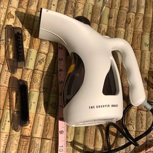 Sharper Image Wrinkle-Free Portable Steamer.